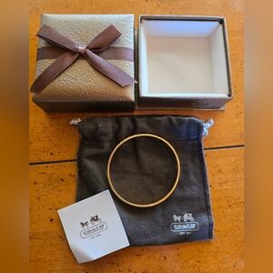 NEW Coach yellow gold plated black and white enamel bangle bracelet.